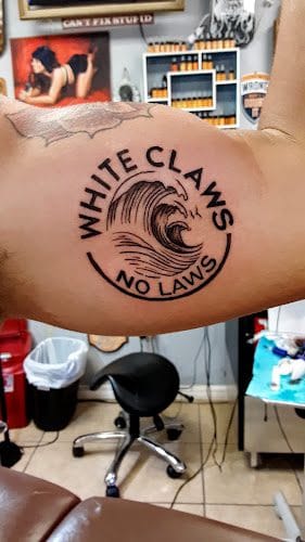 Rose And Dagger Tattoo Studio