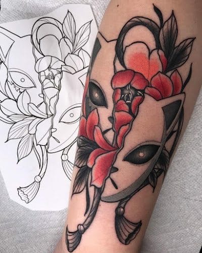 Spitting Ink Tattoo