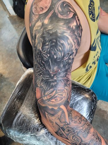 Twisted Tattoo And Piercings